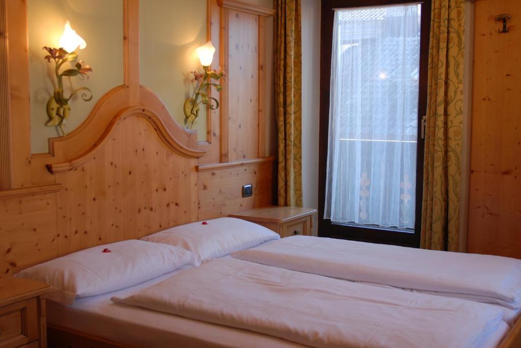 Hotel Loewenwirt Sexten Habitación foto
